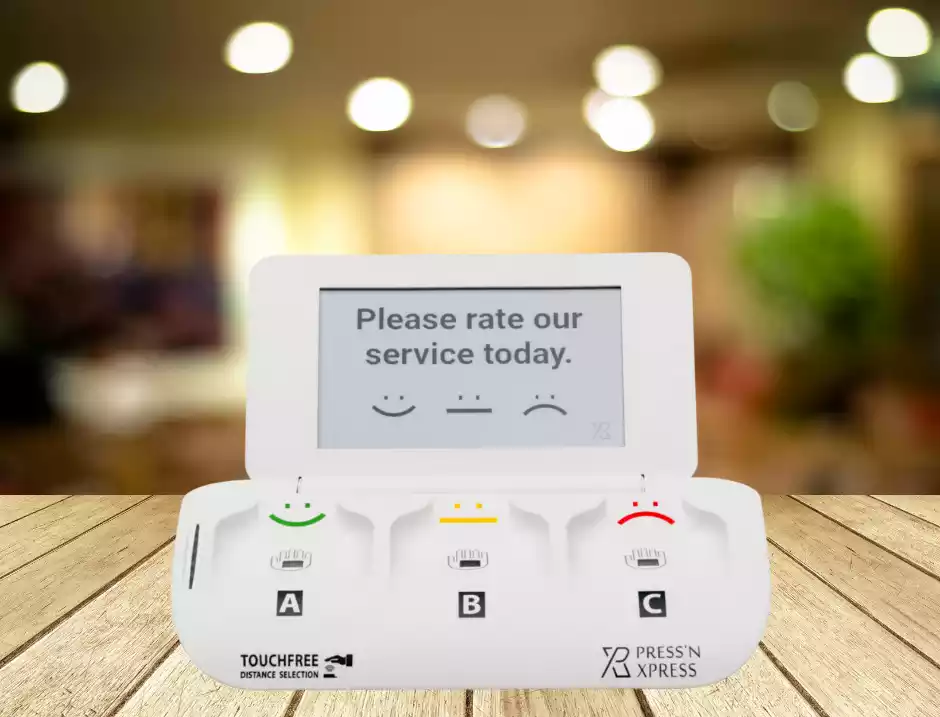 Press'nXPress Touchless Smiley Feedback Device